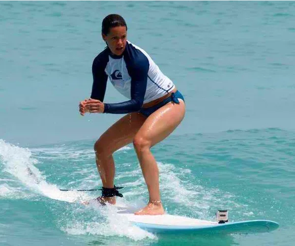 Jenna Wolfe surfing